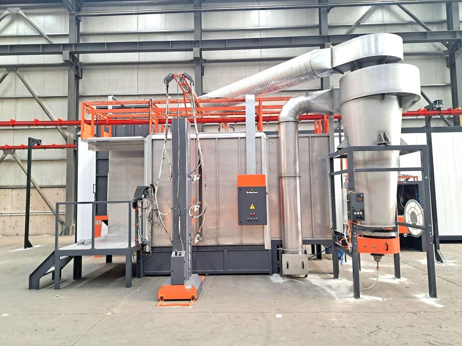 Installed powder coating booth exterior with cyclone powder recovery and ductwork